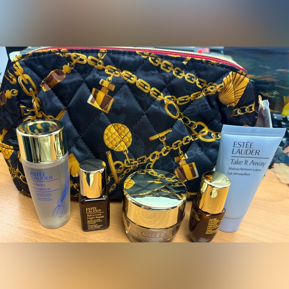 Estee Lauder Black and Gold Women's Cosmetic Bag with everything on photo